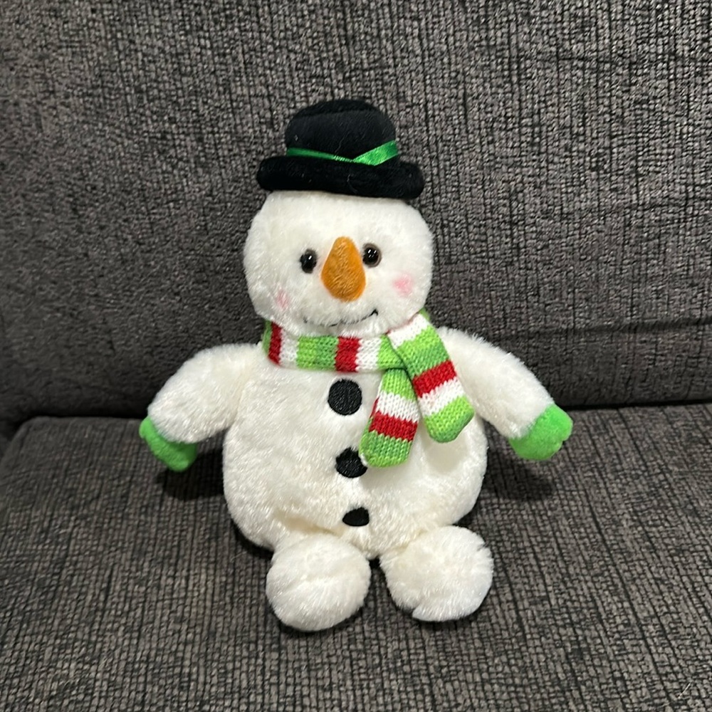 The bearington collection snow man stuffed animal decoration. 9 inches